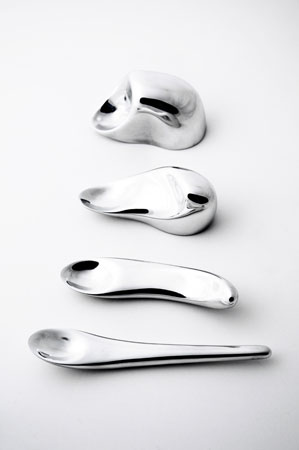 same four-part progression, this time with a spoon