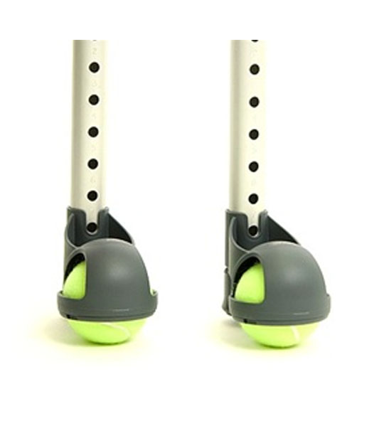 two tennis balls on walker legs, with a specially-designed attachment to hold the balls onto the leg, despite their ill fit as an adaptation.